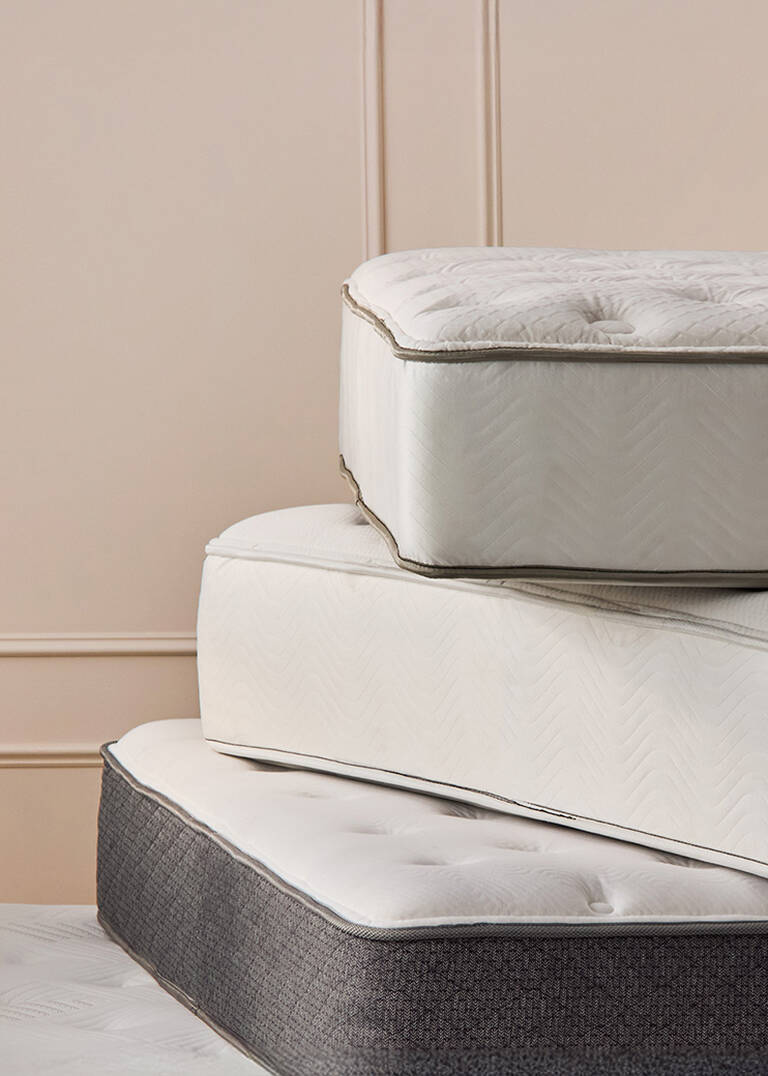 The Luxury Collection bed in hotel room with a view of the sea