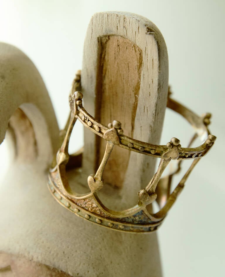 Limited EDITION collab Miami Queen gold figurine crown close-up Limited EDITION collab Miami Queen gold figurine crown close-up