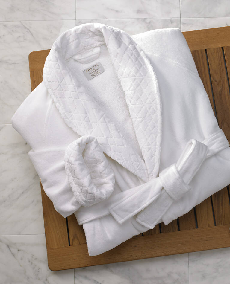 The Luxury Collection Frette robe on wood bath mat