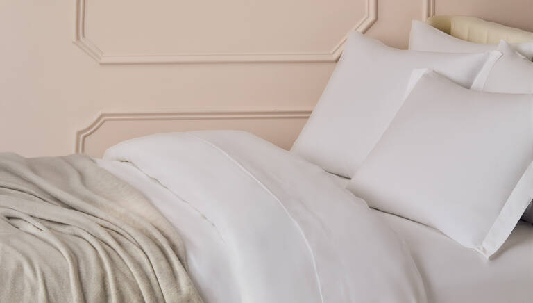 Stack of various Marriott Bonvoy Boutiques bedding options across hotel brands Stack of various Marriott Bonvoy Boutiques bedding options across hotel brands