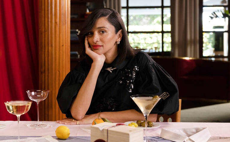 Laila Gohar in The Luxury Collection Hotel with barware collection