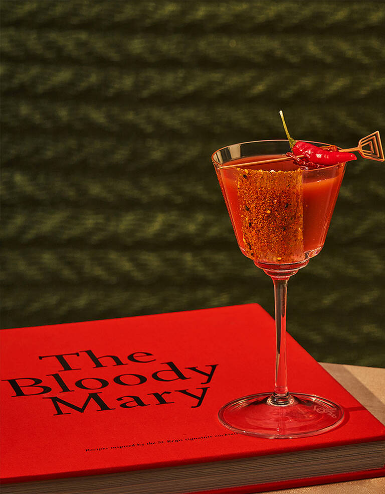 St. Regis Bloody Mary recipe book with signature red cocktail